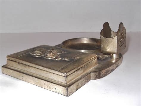 30s mtel box ashtray with metal cigarette on top|Vintage 1930s Ashtray .